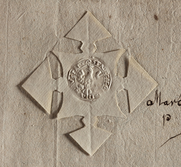 Round seal impression of the town of Kargowa. Crowned single-headed eagle with a shield on its