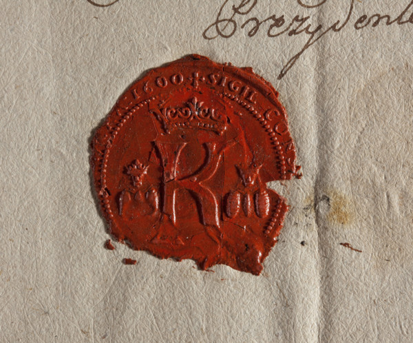Round wax impression of the seal of Kazimierz — a suburb of Kraków. Under the royal crown the