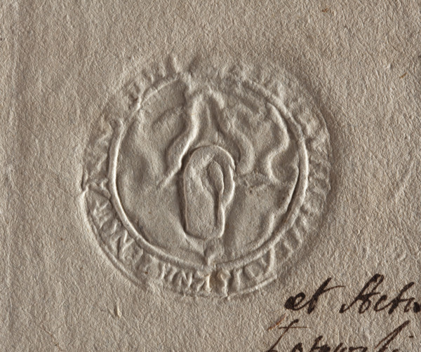 Round seal impression of the town of Knyszyn, Podlaskie Voivodeship. On the shield an outline of an