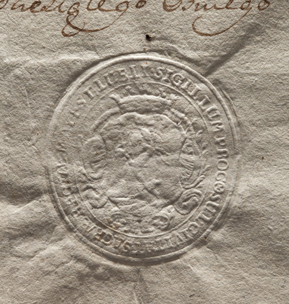 Oval seal impression of the city of Lublin. In a baroque cartouche with a noble crown, a goat