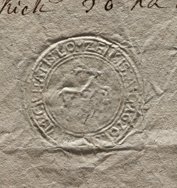 Round seal impression of the town of Lomza. In the central part a deer facing left. In the rim an