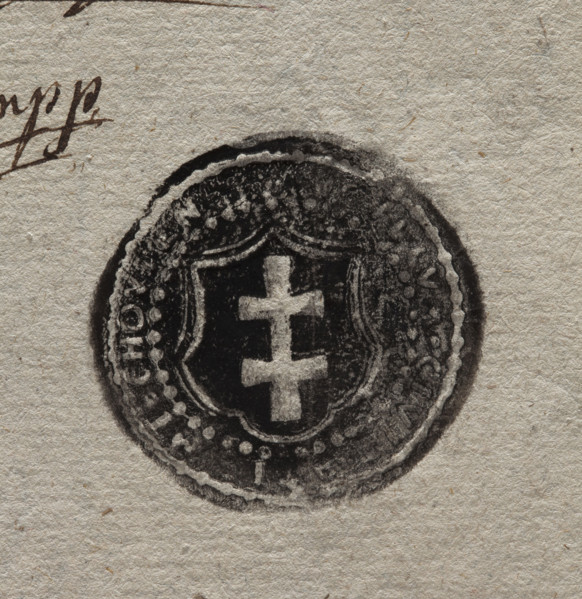 Round ink impression of the city seal of Miechów. In a baroque cartouche a double cross. Rim