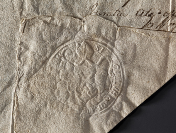 Round seal impression of the town of Mstów. Under the bishop's mitre, a baroque cartouche with two