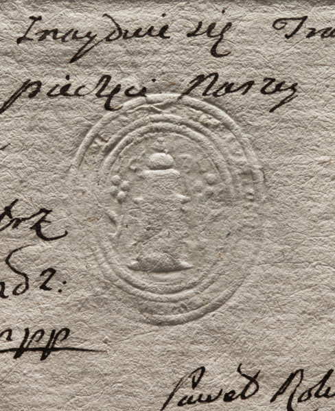 Oval seal impression of the town of Opatówka. Illegible drawing, probably a tower topped with a
