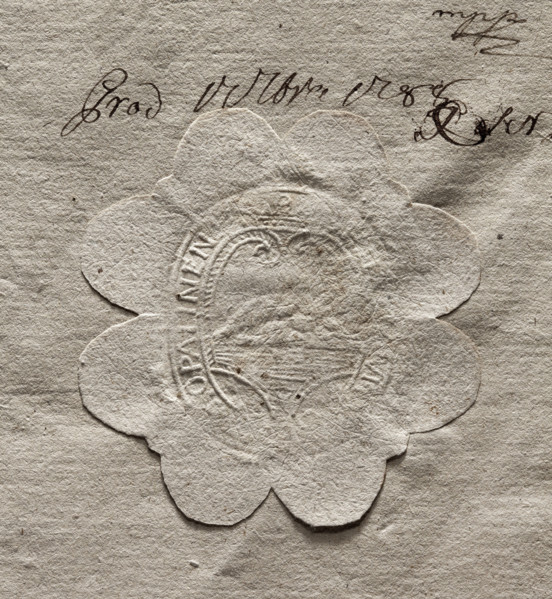 Oval seal impression of the town of Opalina. In the decorative crowned cartouche, an illegible