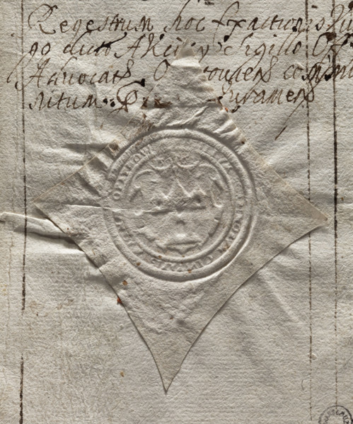 Round seal imprint of the town of Opatów, Sandomierz Voivodeship. In a decorative cartouche there