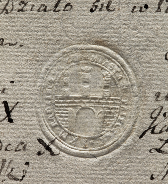 Oval seal impression of the town of Pajeczno. City wall with an open gate and three towers topped