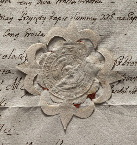 Round seal impression of the town of Proszowice, Kraków Voivodeship. In a round, baroque cartouche