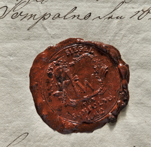 Round wax seal impression of the town of Sompolno, Konin Voivodeship. In a decorative rectangular