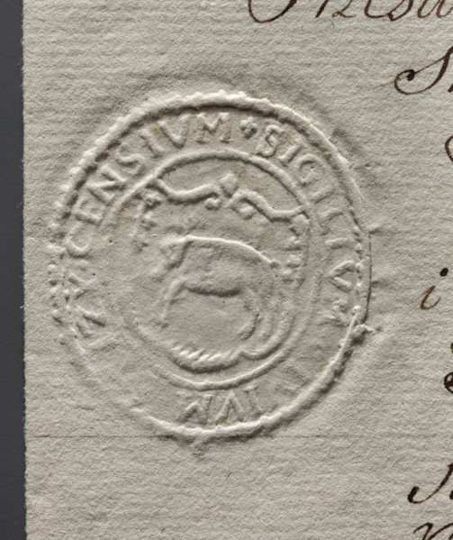 Oval seal impression of the town of Stezyca. In the decorative cartouche a pig facing right.