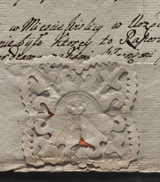 Oval seal impression of the town of Wislica. Tower with a gate and three battlements. Illegible