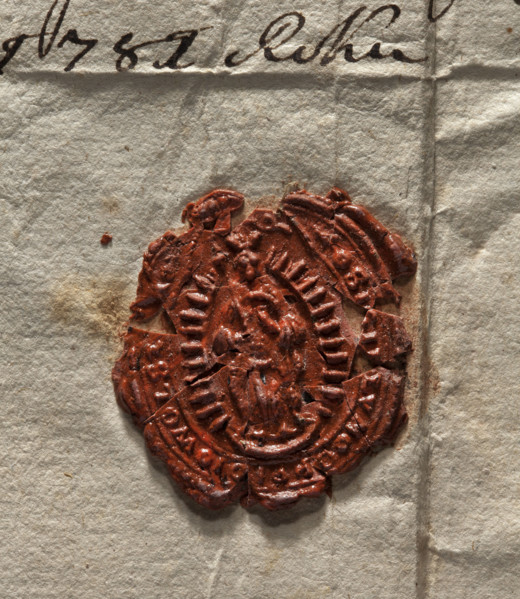 Oval wax impression of the seal of the town of Wolsztyn. In an oval rim with rays, the Virgin Mary