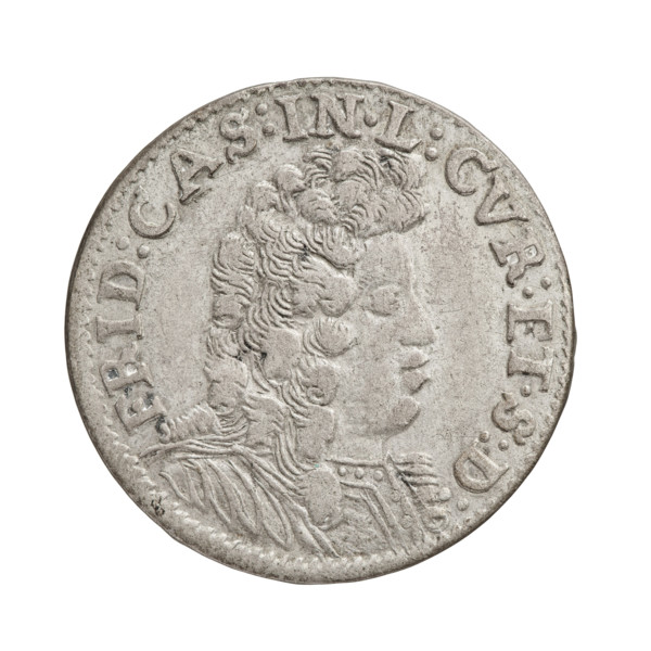 Obv. In the border, a male bust in armor and a wig turned to the right, separating the inscription