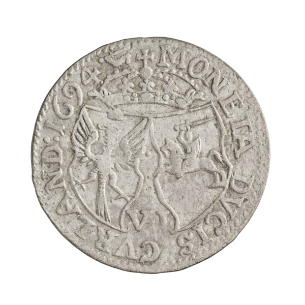 Obverse: In the border, a male bust in armor and a wig turned to the right, separating the