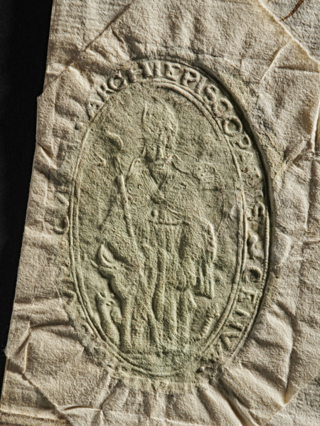 Official seal, archbishop's curia; two seal impressions on a document. Each impression shows a