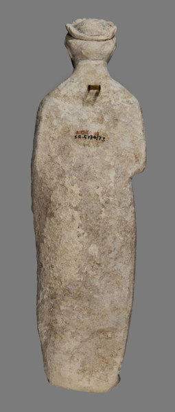 Votive figure of a youth holding a bird, votive offering, Cypriot sculpture. Figurine of a youth