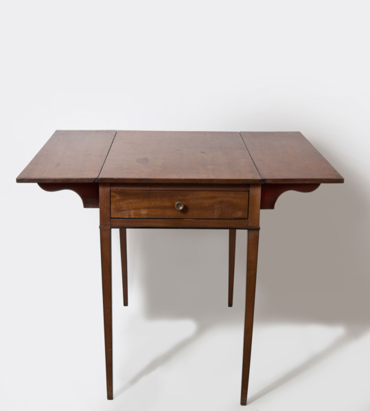 Table, rectangular, with flaps on the long sides and a drawer on one of the short sides, supported