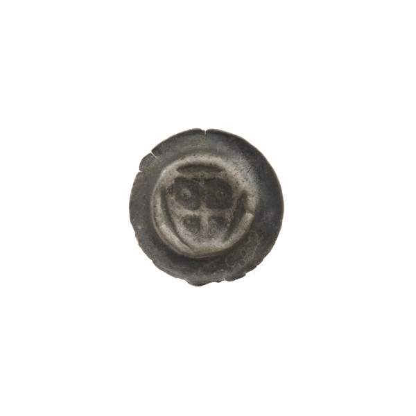 Denarius - bracteate: triangular shield with a cross whose arms reach the edge; in both upper