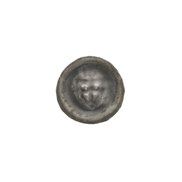 Denarius — bracteate; triangular shield with a cross whose arms reach the edge, a cross above it;