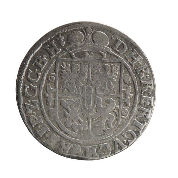 Obv.: A bust in armor turned right, girded with a sash, holding a sceptre in his right hand. In