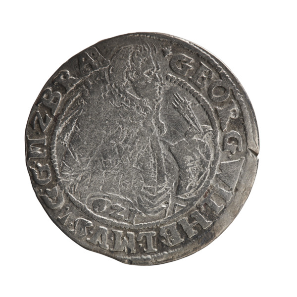 Obv. A bust in armor turned right, girded with a sash. A sceptre in his right hand. In front of the