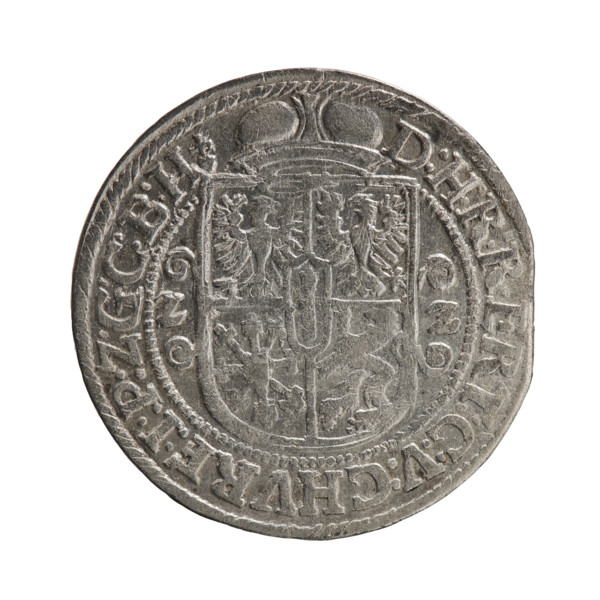 Obv. Bust facing right in a mitre, wide ruff, and armor girded with a sash. A sceptre in his right