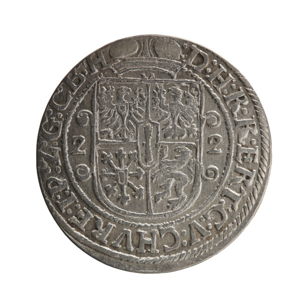 Obv. Bust facing right in a mitre, wide ruff and armor girded with a sash. A sceptre in his right