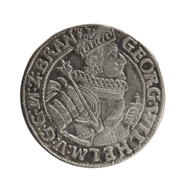 Obv. Bust facing right in a mitre, wide ruff and armor girded with a sash. A sceptre in his right