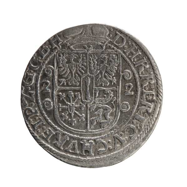 Obv. Bust facing right in a mitre, wide ruff and armor girded with a sash. A sceptre in his right