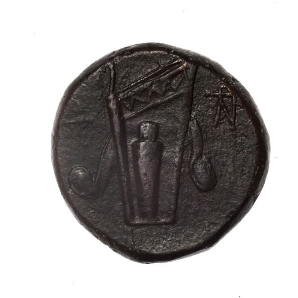 bronze coin, Pantikapaion; obv.: head of young Dionysus in an ivy wreath facing right; rv.: bow and