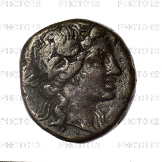 Bronze coin, Pantikapaion; obv.: head of young Dionysus in an ivy wreath facing right; rv.: bow and