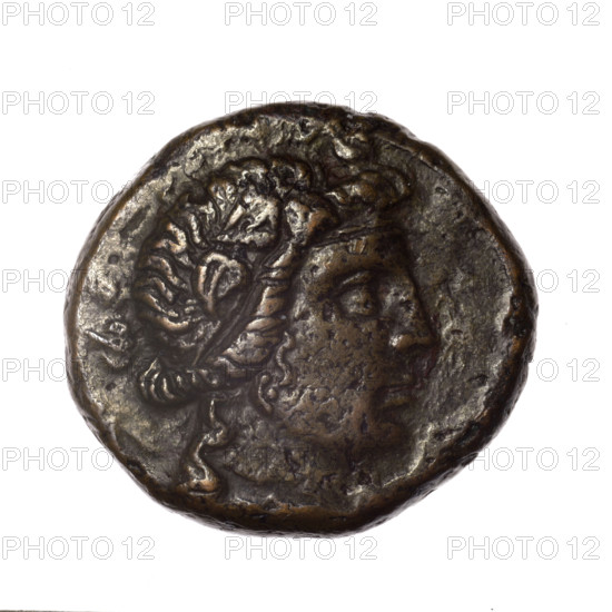 bronze coin, Pantikapaion; obv.: head of young Dionysus in an ivy wreath facing right; reverse: bow