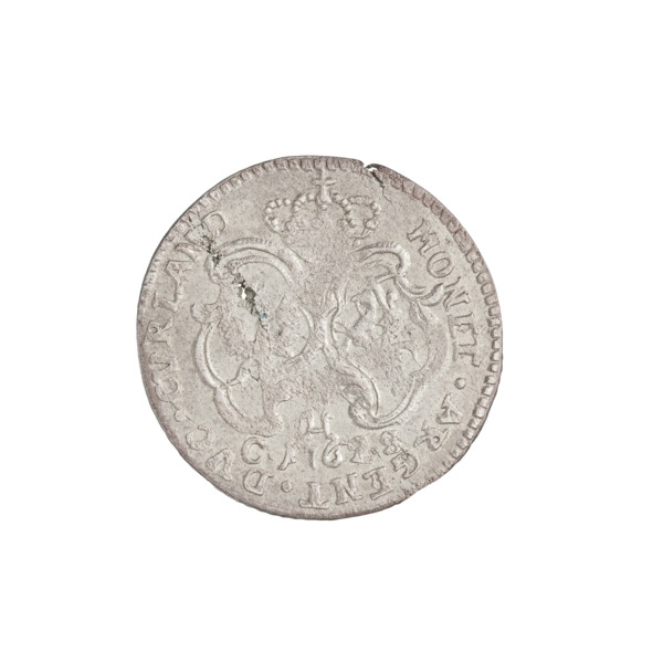 Obverse. Male bust in armor girded with a sash and wig, turned to the right, divided by the