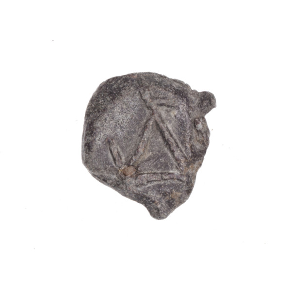 Fragment of a double-sided Drohiczyn seal. On one side a two-pronged seal with a distinct large