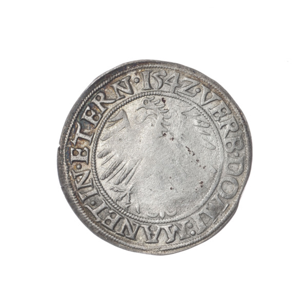 Male bust turned right, with a beard and sideburns, in a coat with a wide collar; obverse rim
