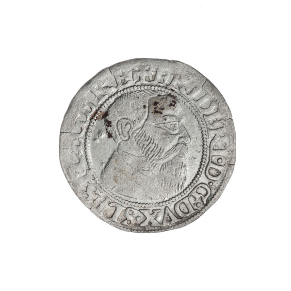Obverse: Male bust turned right, with a beard and sideburns, in a coat with a wide collar; in the