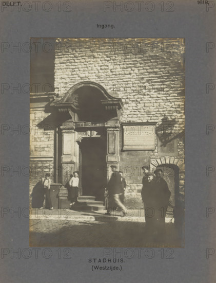 Entrance to the town hall in Delft with boys in front of the gate, Town Hall (West side.) Entrance,