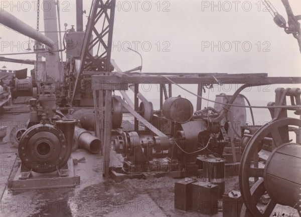 Image of SS Altenburg at Singapore, Belawan Ocean Harbor, photograph, Machinery on deck of the SS