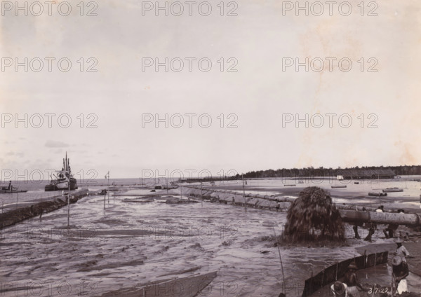 Sand loading by GG Idenburg. Height 2m + BP.), Belawan Ocean Harbour, photograph, Sand loading by