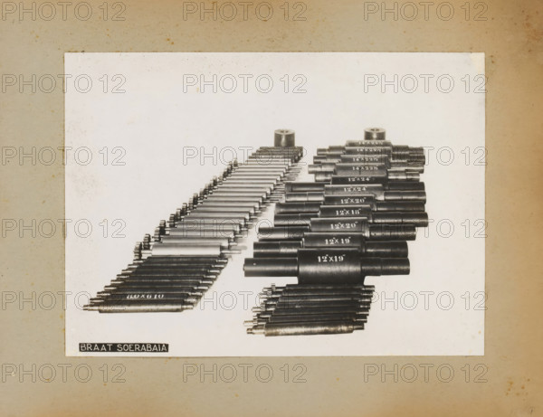 Exhibition of machine parts, album page, photograph, Album page with a photo of an exhibition of