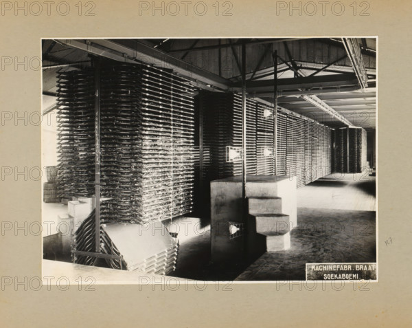 Factory hall with racks, album page, photograph, Album page with a photo in a factory hall with