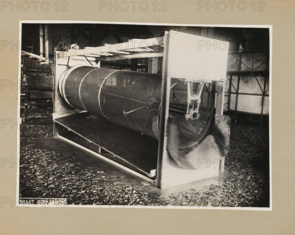 Drum, album page, photograph, Album page with a photo of a drum for a machine. Part of a photo