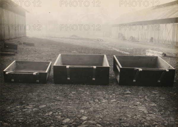 Three bins, album page, photograph, Three bins or drawers, parts of a machine. Part of a photo