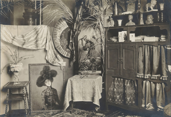 Interior with a cupboard, sculptures and a painting, album page, photograph, This photo is part of