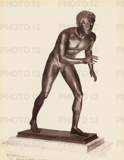 Bronze sculpture of an athlete, Museo di Napoli Discobolo, album page, photograph, This photo is