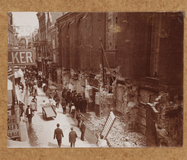 Street view with the Nieuwezijds Chapel in Amsterdam during the demolition in 1908 (former title),