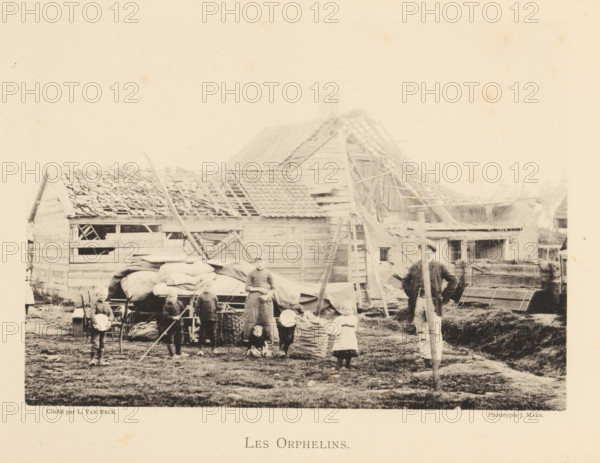 Children who were orphaned after an explosion of a munitions factory in Oosterweel near Antwerp in