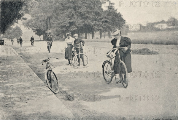 Au Bois de Boulogne, Cyclists in the Bois de Boulogne in Paris, France, page, photomechanical