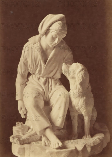 Sculpture of a boy and a dog by Leopold Borbone, photograph, This photograph is part of a cover