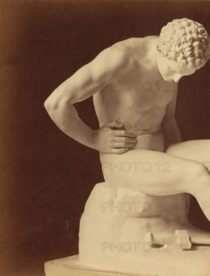 Sculpture of a man and a sword by Leopold Borbone, photograph, This photograph is part of a cover